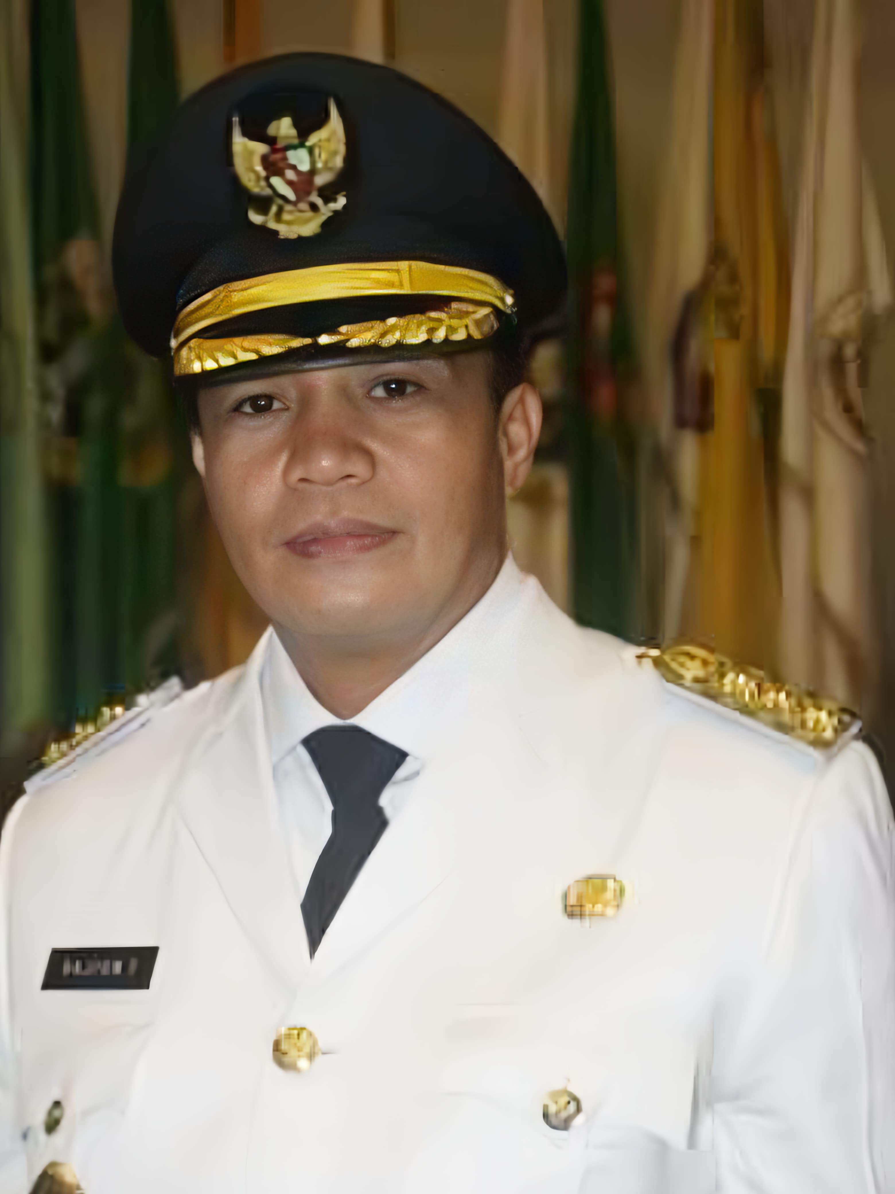 Drs. L. M. Rajiun Tumada, M.Si